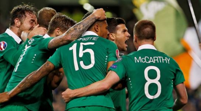 History: Shane Long celebrates with teammates after scoring for the Republic of Ireland against Germany en route to qualifying for Euro 2016