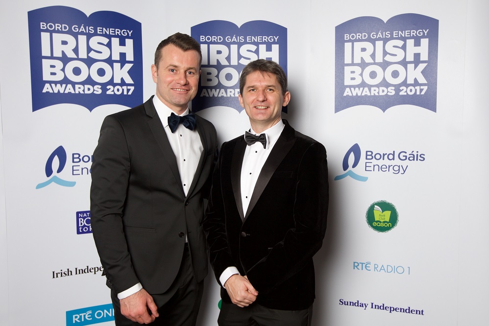 28/11/2017 NO REPRO FEE.
Pictured at the Bord Gáis Energy Irish Book Awards which took place on Tuesday, 28th November in The Clayton Hotel, Burlington Road were Shay Given and John Trainor
Celebrating its twelfth anniversary this year, the Bord Gáis Energy Irish Book Awards has become the major event in the literary calendar with some of Ireland’s, and indeed the world’s, most recognised authors gathering together in a spirit of camaraderie and friendly competition to celebrate the success of the past year.
This year, over 50,000 readers and book lovers made their voices heard and voted to select the winners in each category.
The awards ceremony was presented by Keelin Shanley accompanied by green room presenter Evelyn O’ Rourke. Highlights from the awards ceremony including exclusive back stage interviews will be broadcast during the primetime slot of 9:30pm, the night following the awards, on Wednesday, 29th November 2017.
www.bgeirishbookawards.ie
#BGEIBA
@BGEIBAS
For further details, please contact:
Breda Brown / Aisling Hinchy
Unique Media
01 5225200/ 087 6966 884 (AH)
Pic: Patrick Bolger Photography