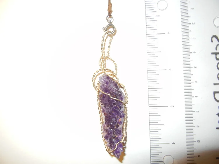 Amethyst cluster with gold-filled wire