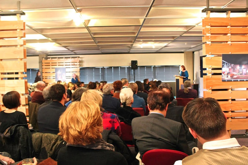 Above: Participants listen to artist Ursula Hübner. Photo: Taylor Lenze