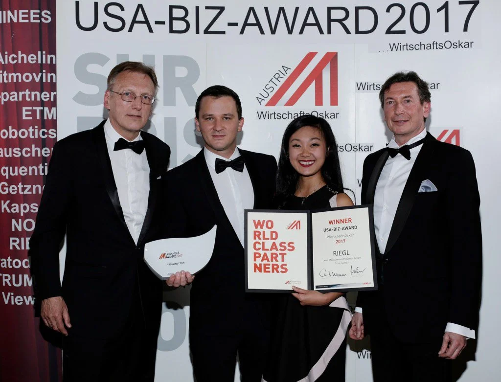 RIEGL accepting the USA Biz Award. From left: Rudolf Thaler (Austrian Trade Commissioner in Los Angeles), Johannes Riegl, Jr. and My-Linh Truong (RIEGL), and Walter Koren (Head of Austrian Foreign Trade Organization). Photo Credit: Jim Lee.