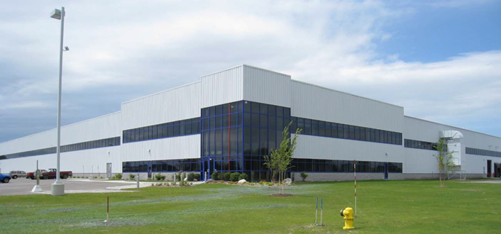 TGW Systems will move its Norton Shores operations, currently on Grand Haven Road, to 1300 E. Mt. Garfield Road in Norton Shores. The 170,000-square-foot facility was occupied by Wacker Neuson. (c) TGW Systems