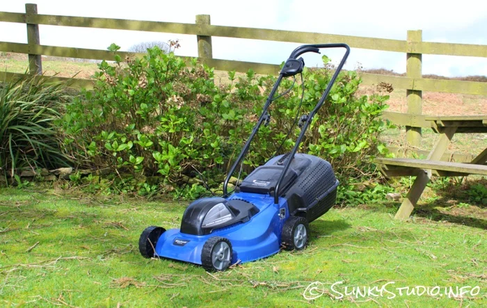 Einhell BG-EM 1437 Electric Lawnmower in Garden with Picnic Bench.jpg