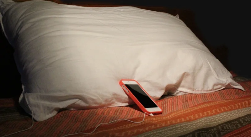 iMusic Bluetooth Pillow iPhone Plugged in.jpg