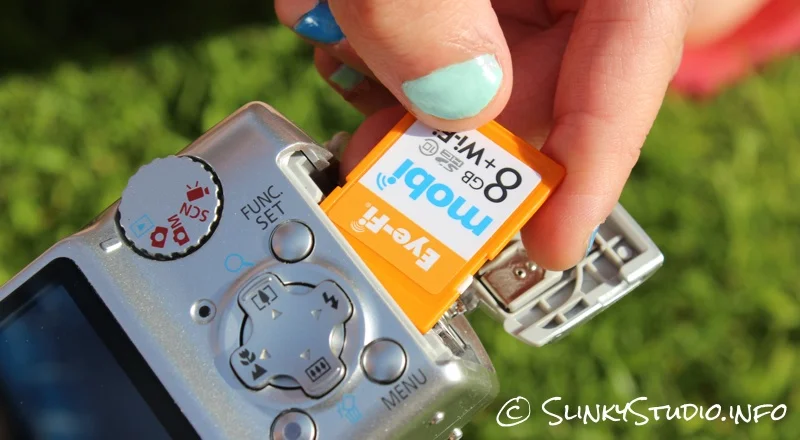Eye-Fi Mobi Wireless SD Card Inserting Into Camera.jpg
