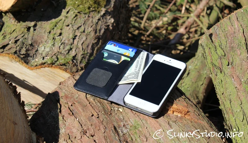Moshi Overture Wallet Case for iPhone 5:5s on log in forest woodland card & dollar bill money.jpg
