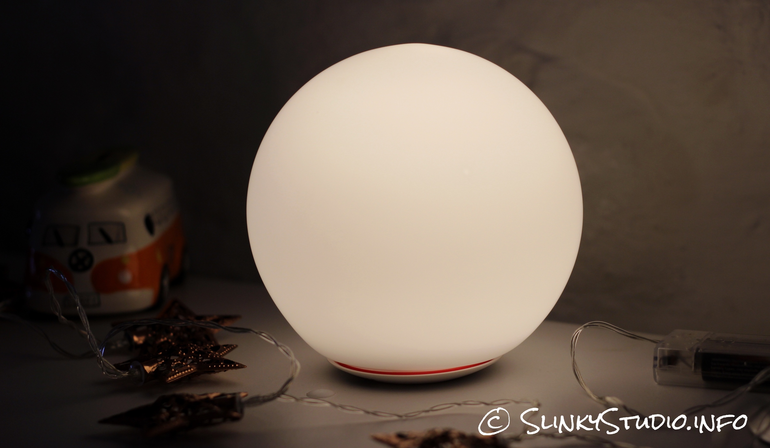 MiPow Playbulb Sphere Light On Shelf With Other Lights.jpg