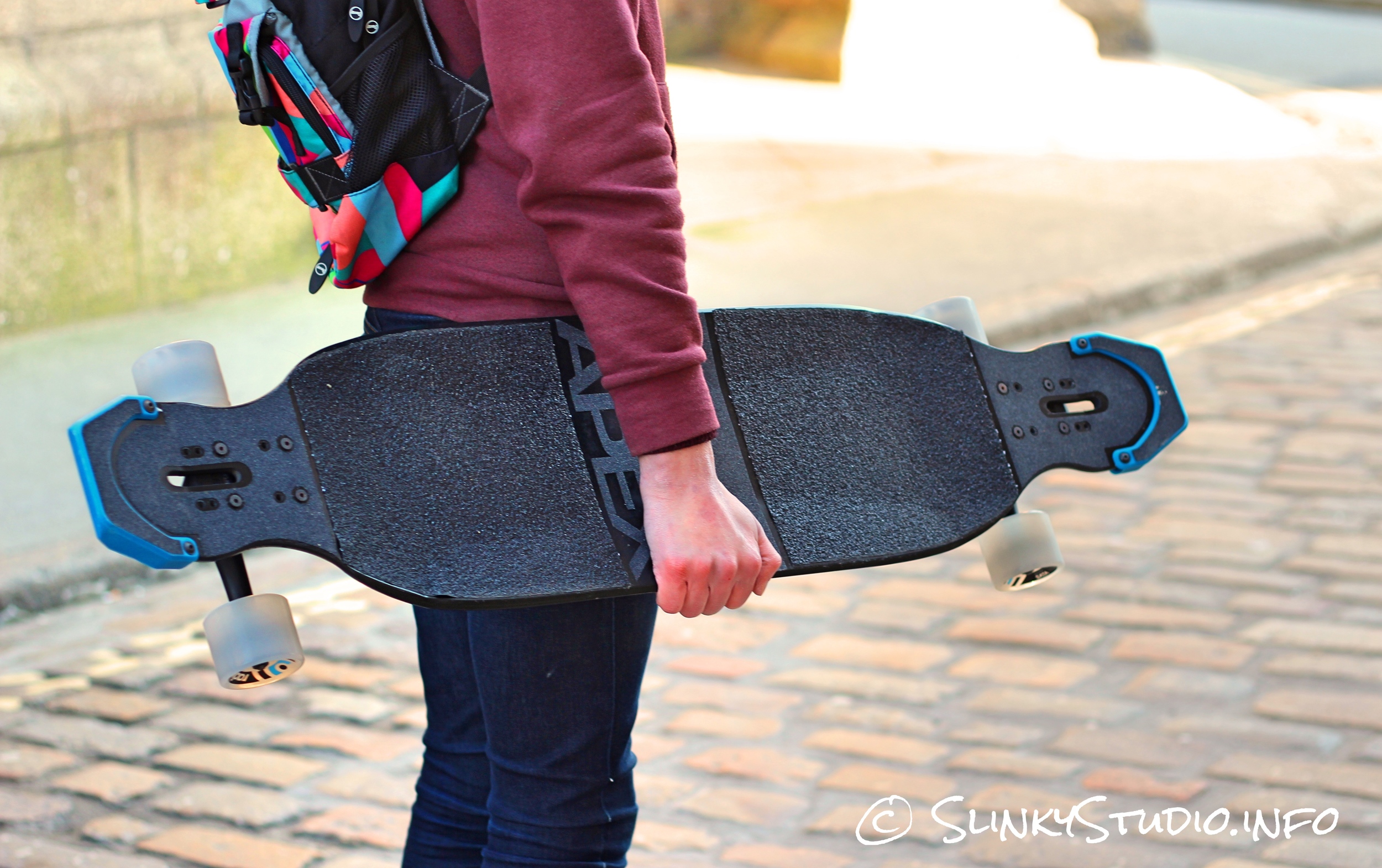 Original Skateboards Apex 40 DiamondDrop Longboard Carrying Underarm.jpg