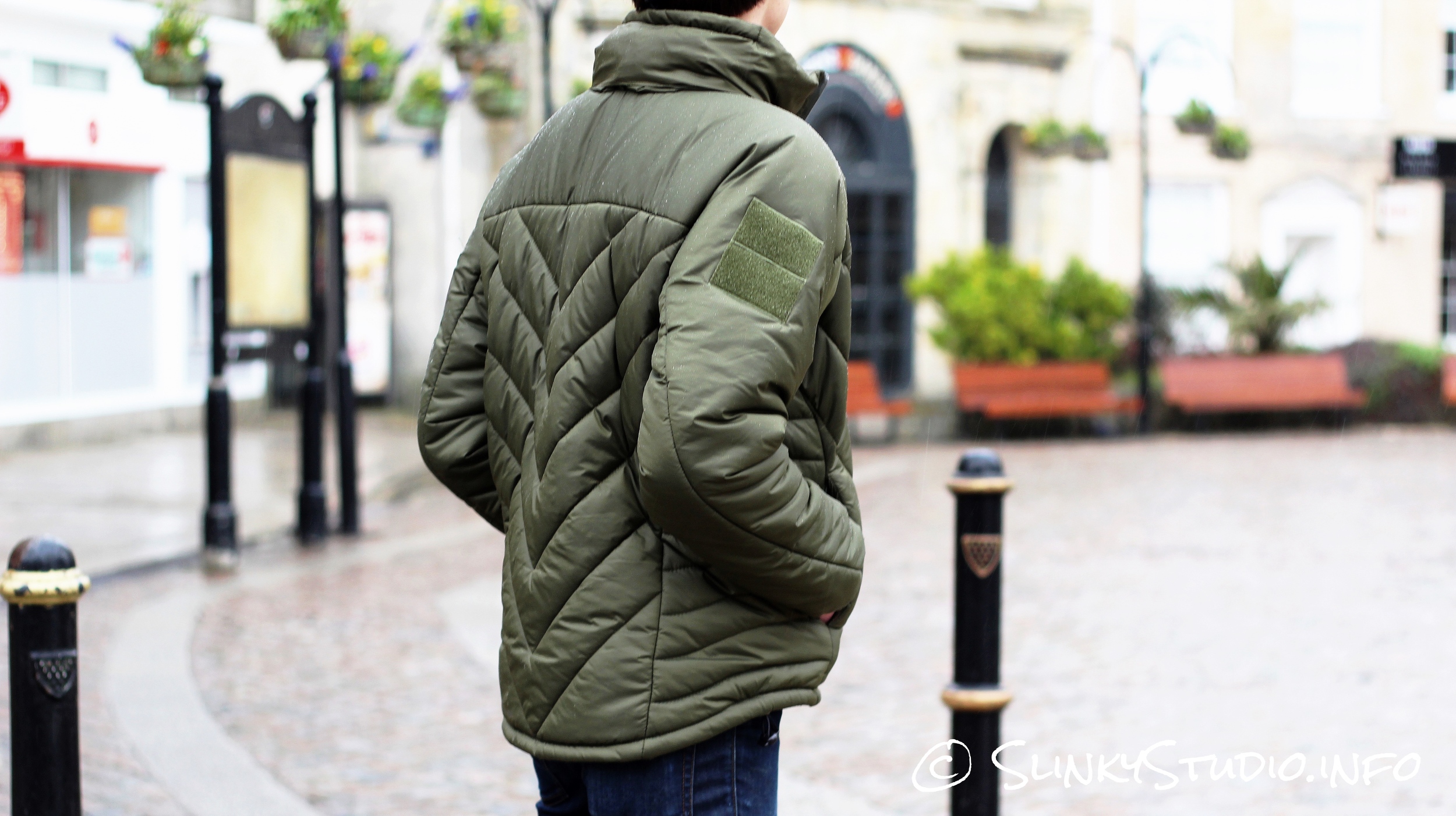 Snugpak SJ6 Jacket Behind View Hands in Pockets.jpg