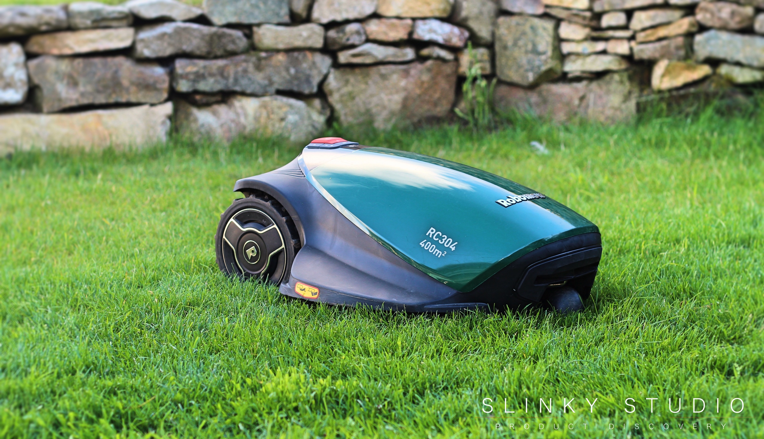 Robomow RC304 Robot Lawnmower Cutting Lawn Front View.jpg