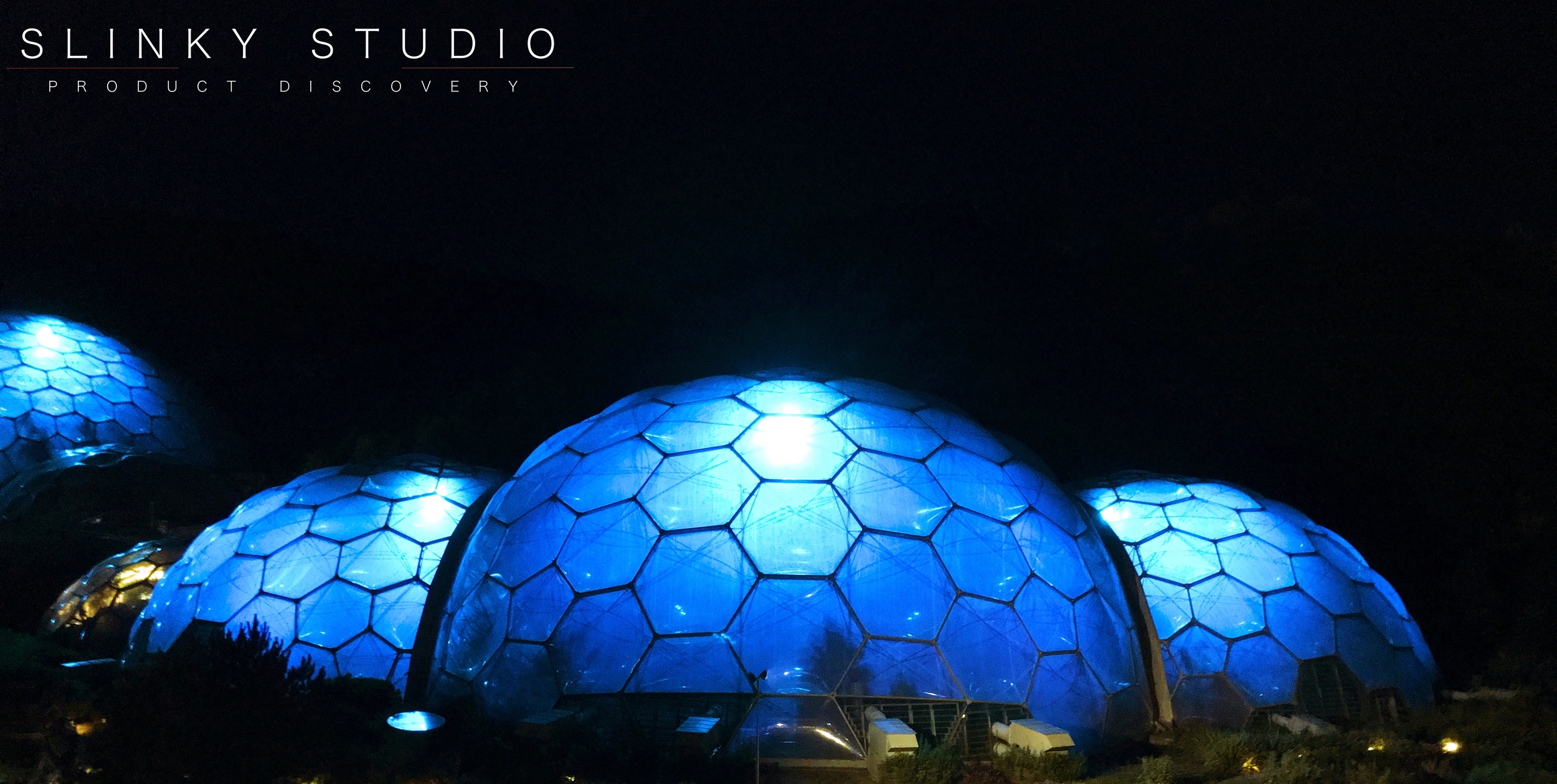 The Eden Project Conrwall Lit Up At Night in Blue.jpg