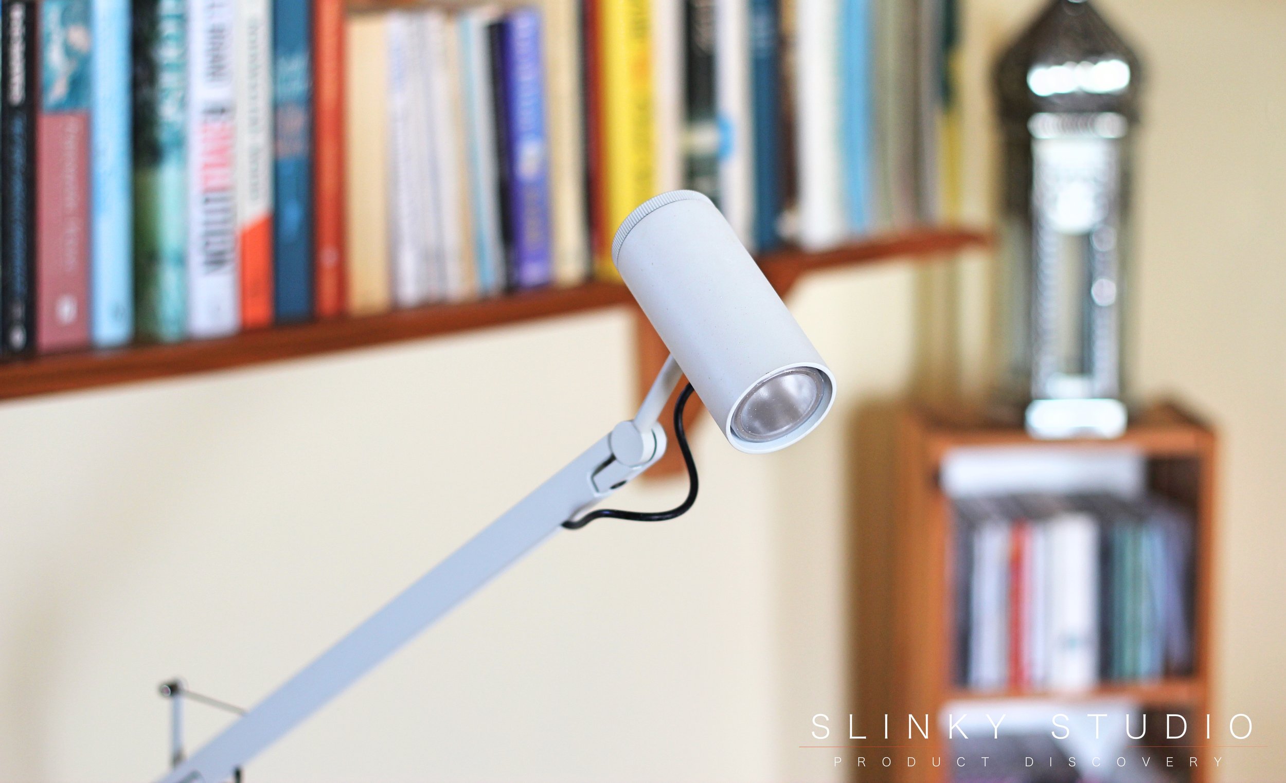Marset Polo Lamp LED Head Close Up in front of bookshelf.jpg