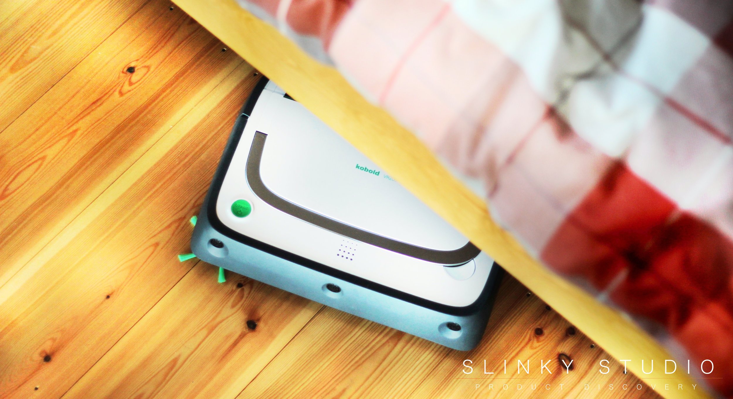 Vorwerk Kobold VR200 Robot Cleaner Going Underneath Bed.jpg