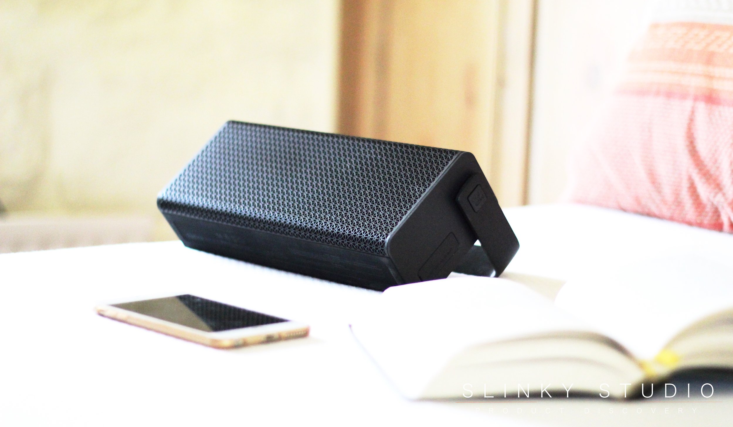 Edifier Rave MP700 Speaker on bed with book.jpg