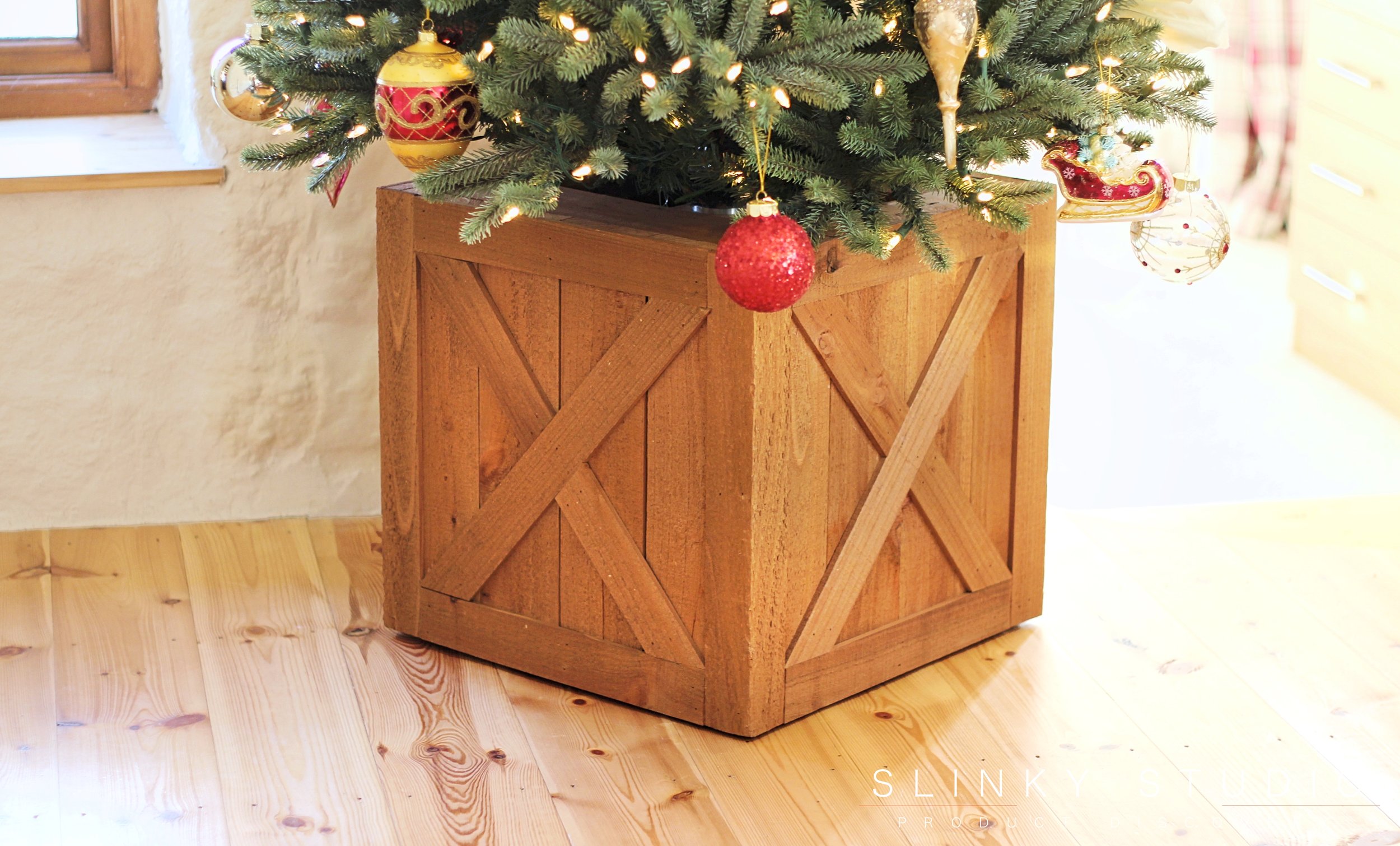 Balsam Hill Royal Blue Spruce Christmas Tree Wooden Rolling Tree Stand.jpg