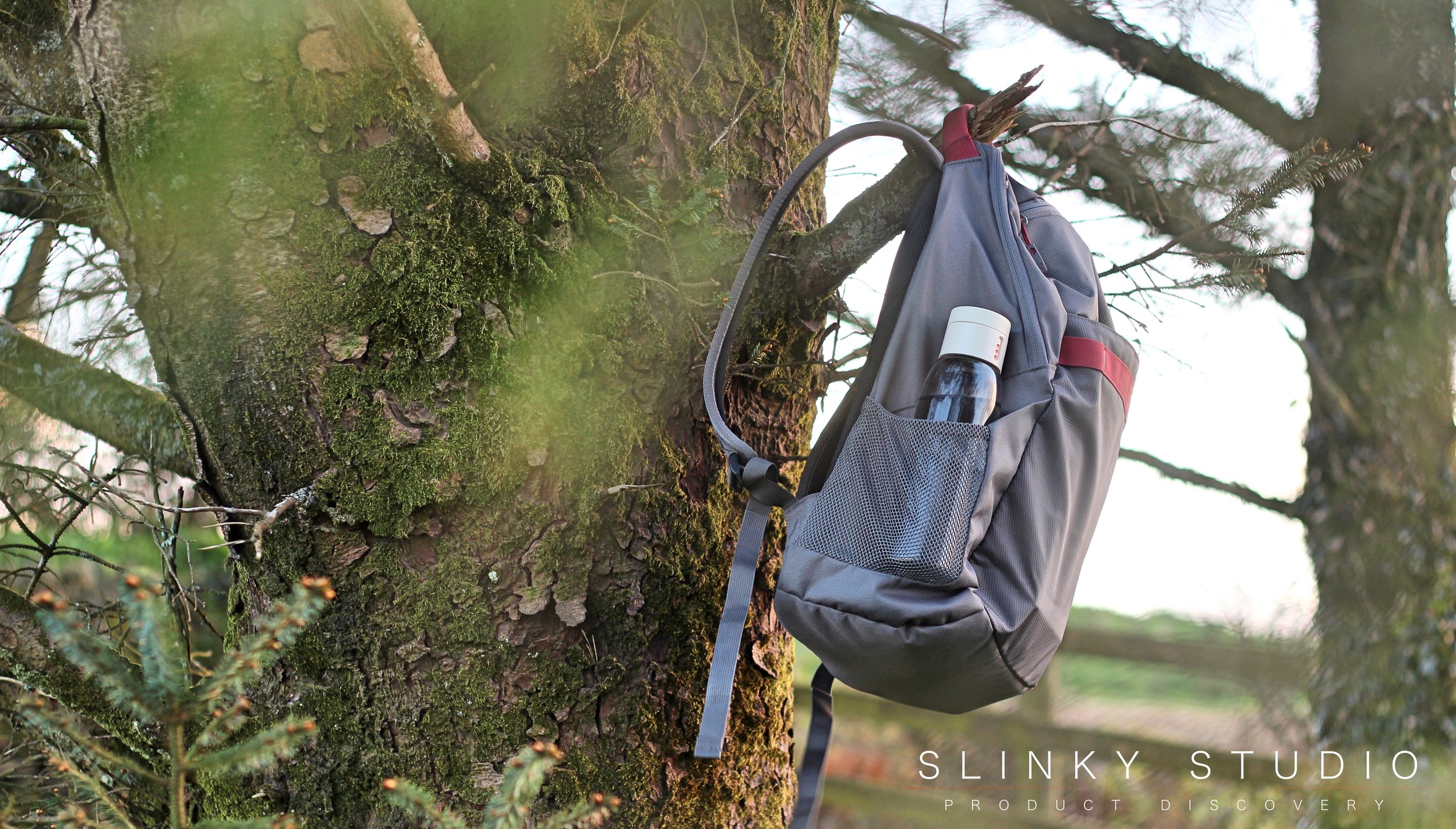 STM Saga Backpack Side View Hanging From tree Branch.jpg