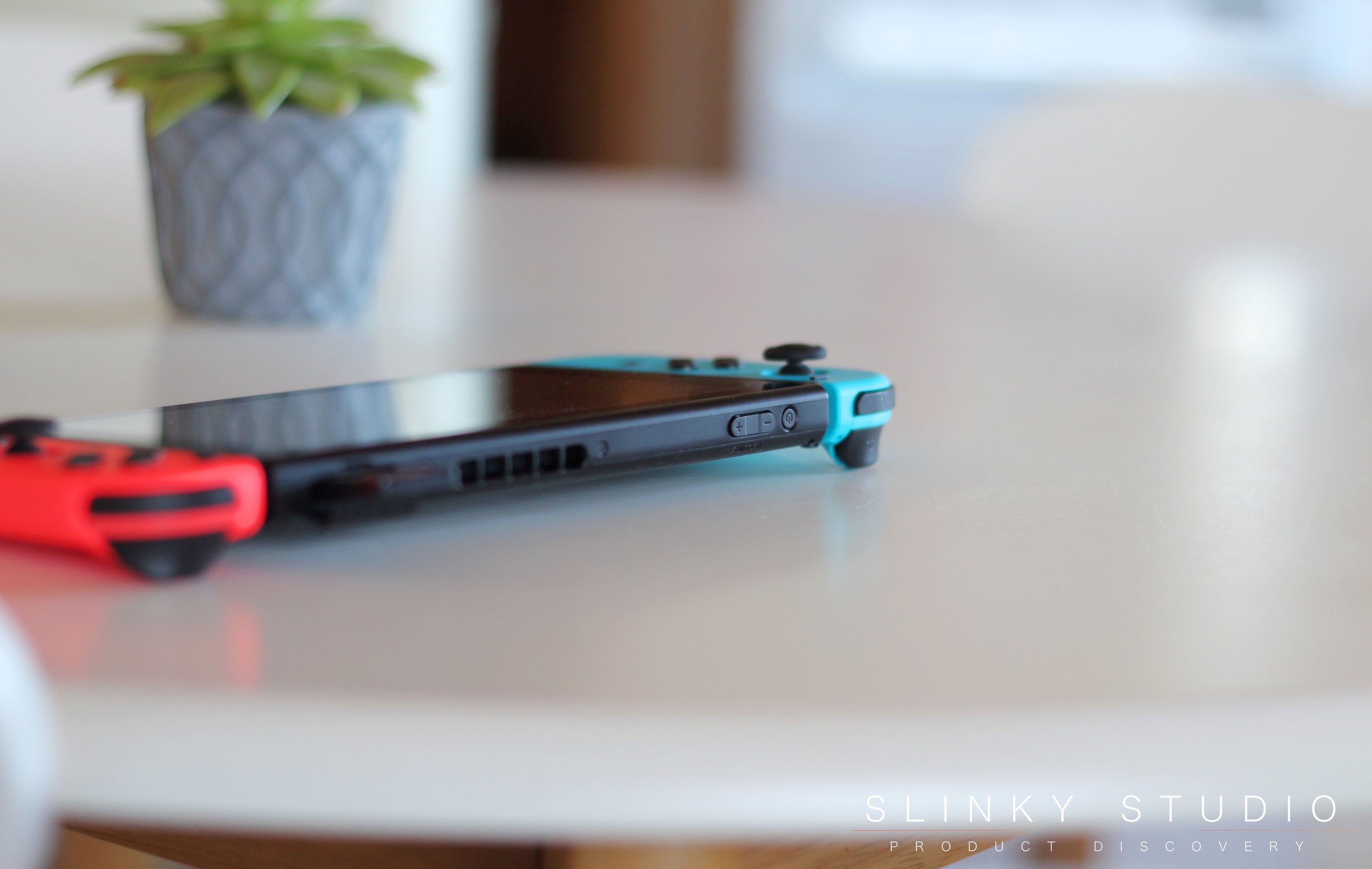 Nintendo Switch Volume & Power Buttons Side View.jpg