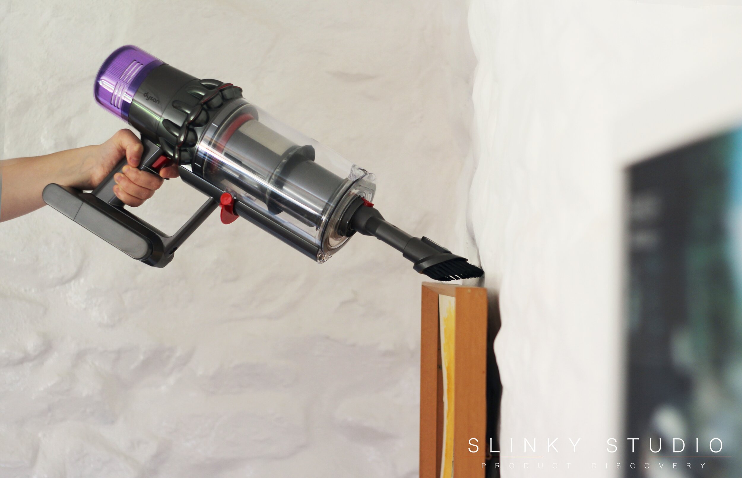 Dyson V11 Absolute Cleaner Side View Dusting Painting.jpg
