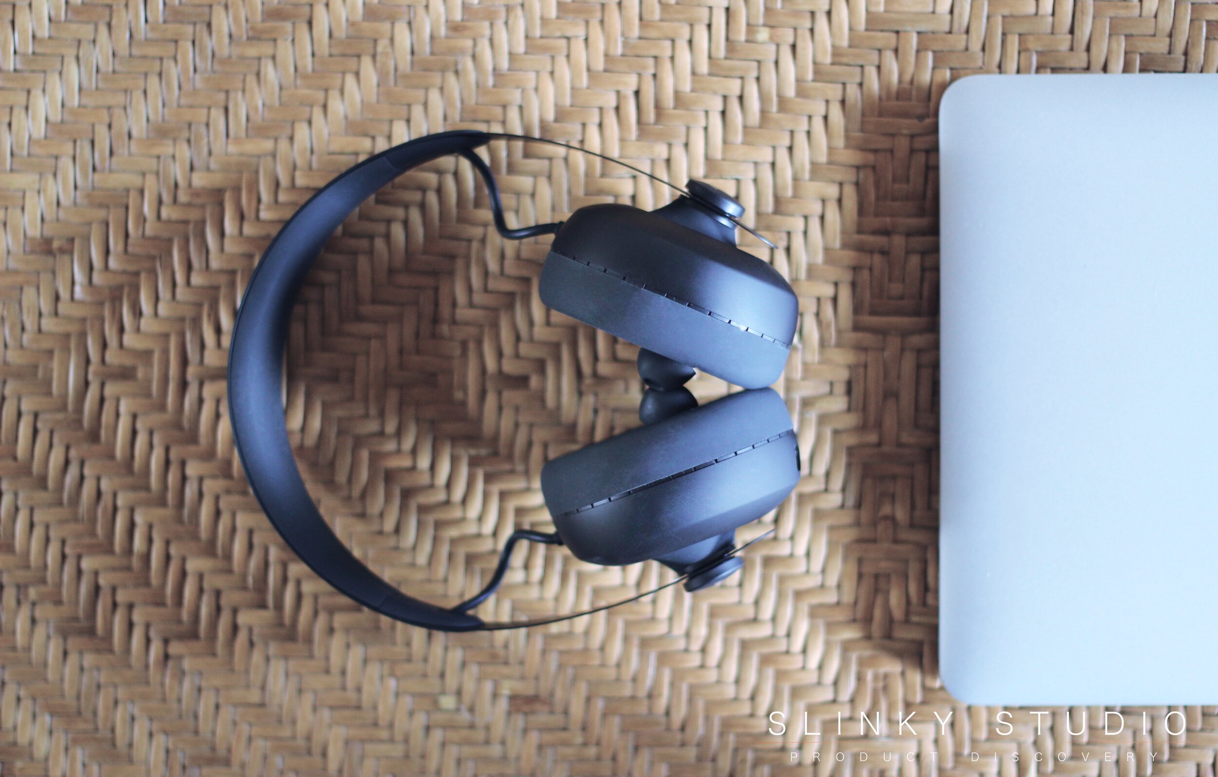 nuraphone Headphones Above View Next to MacBook Pro.jpg