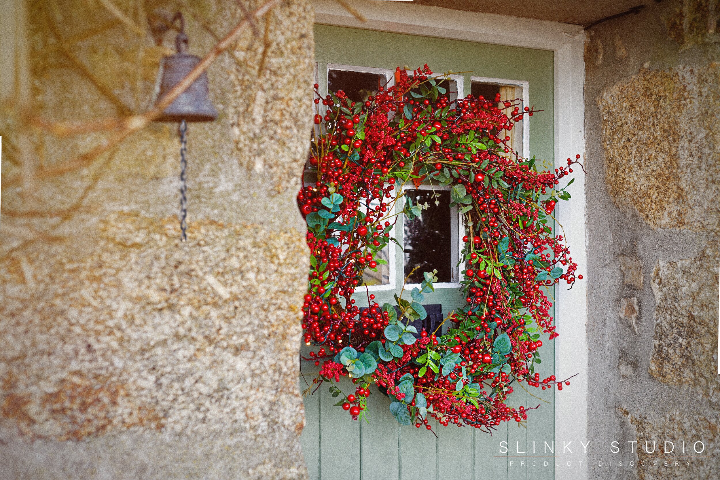 Balsam Hill Mixed Berry Festive Wreath Hanging on Door Sunny Winter Day Cottage.jpg