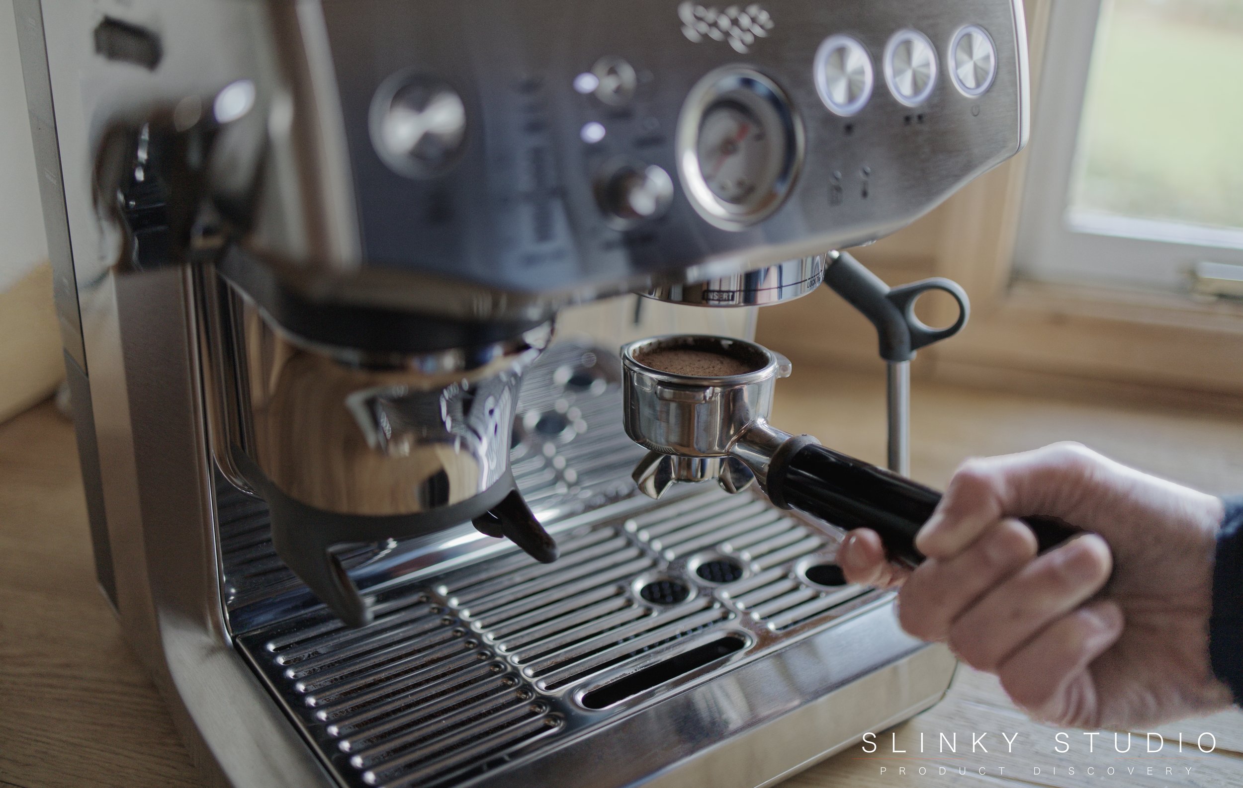 Sage Barista Express Impress Espresso Coffee Machine Tamped Coffee Grounds in Portafilter.jpg