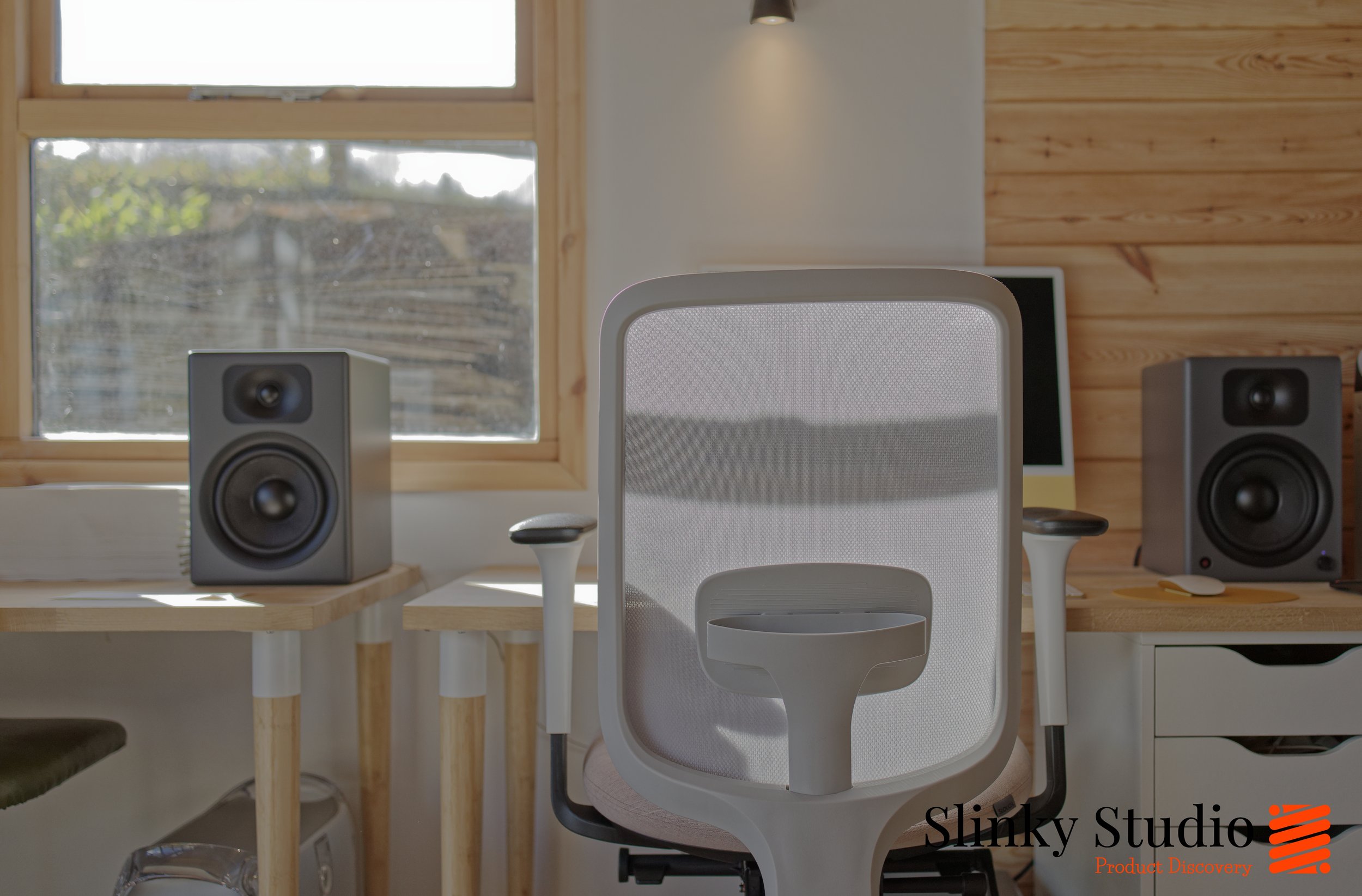 Slouch Chair Task One Grey Frame Pink Cushio Oak Desks in a Scandi Nordic Studio Enviroment with yellow iMac.jpg