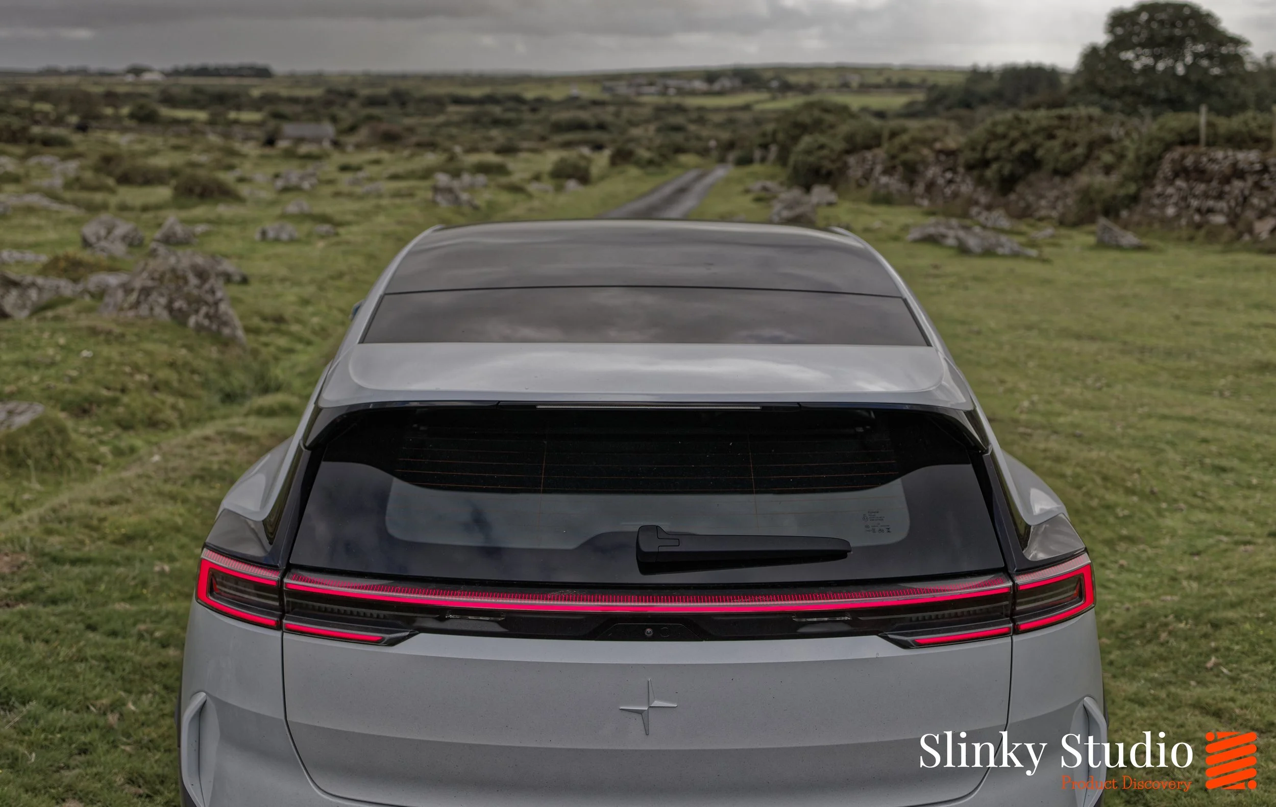 Polestar 3 Back of car view and Lightbar Full View in Snow White .jpg