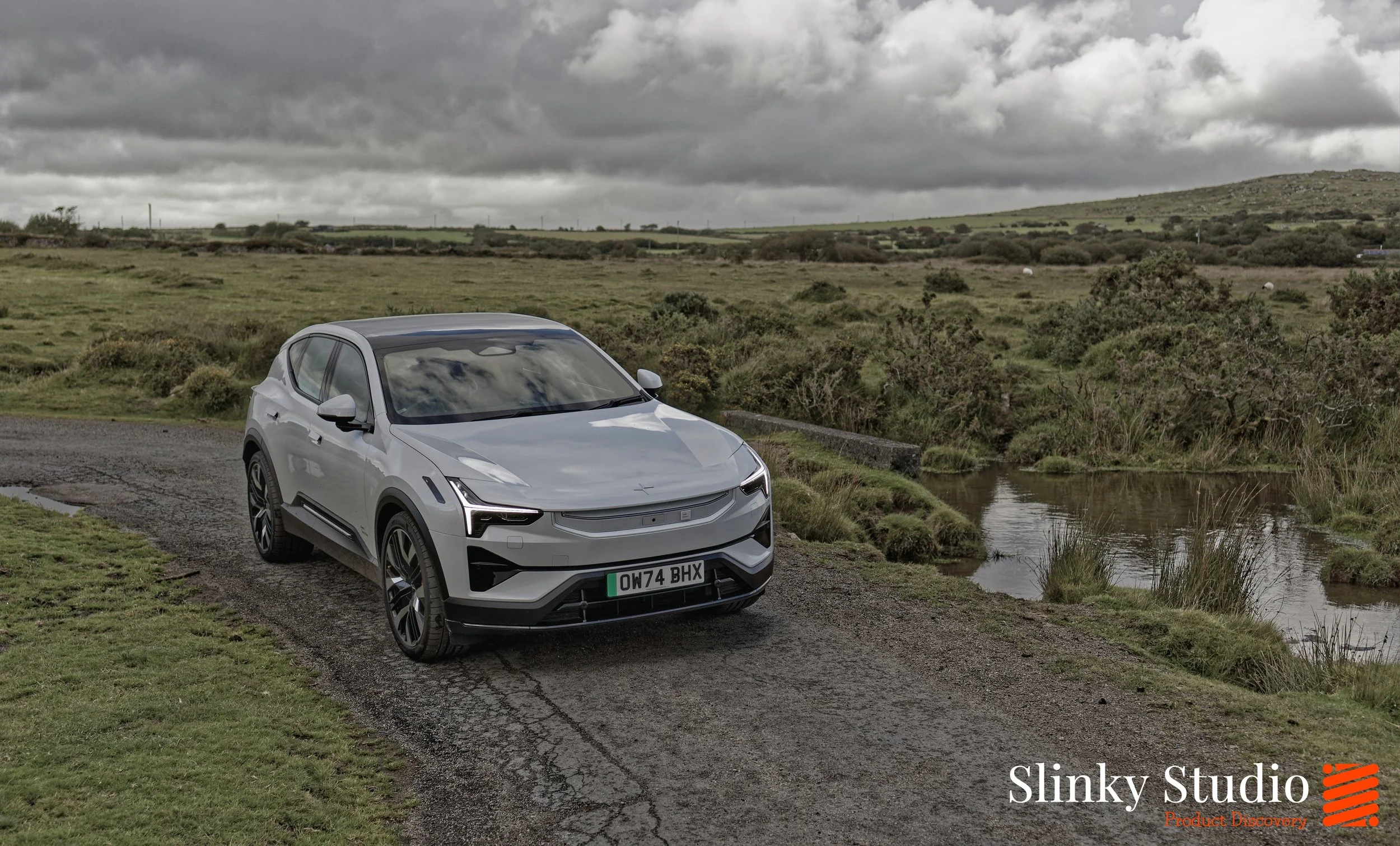 Polestar 3 in Snow White Colour Cornwall Autumn Countryside featuring a lake.jpg
