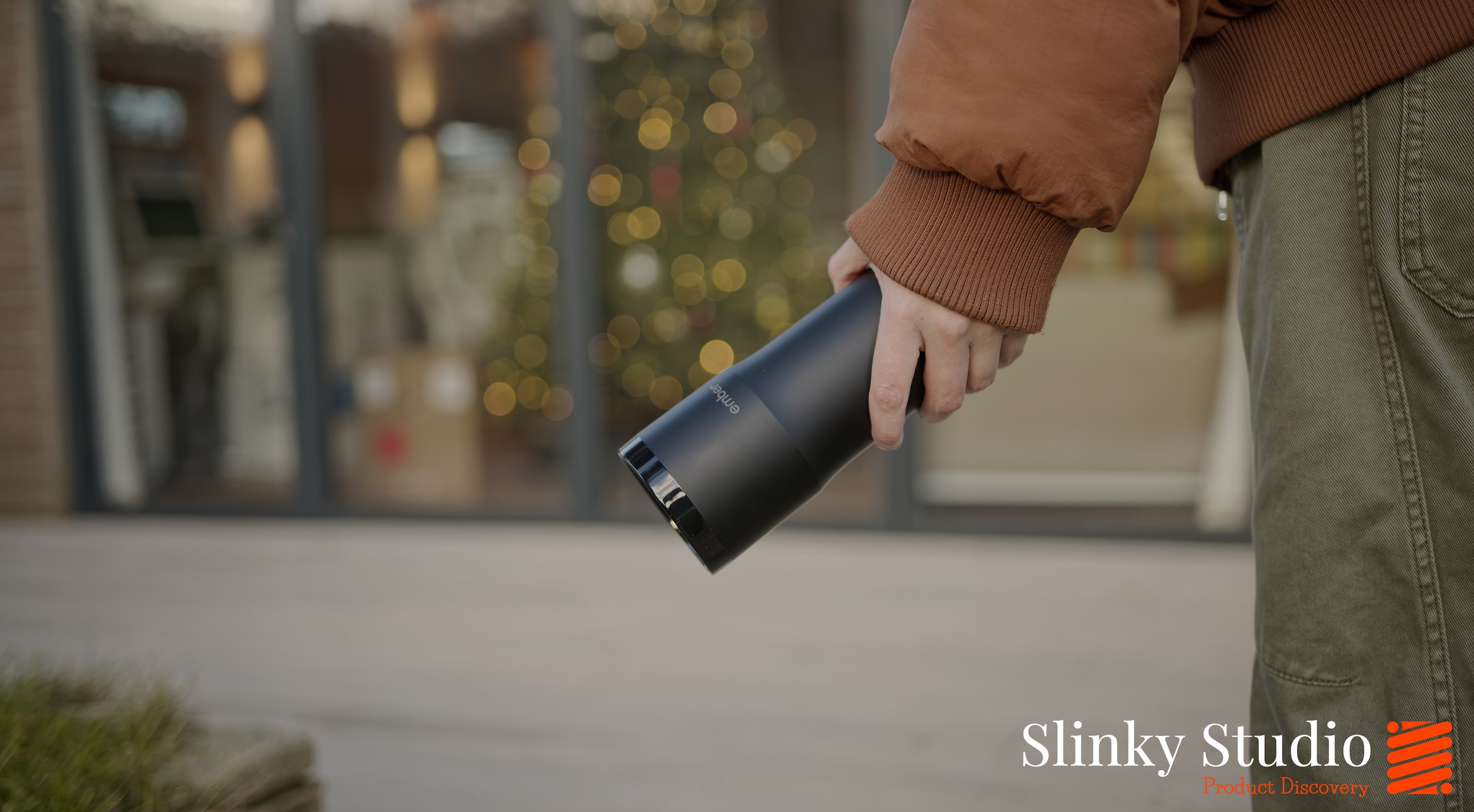 Ember Travel Mug 2+ Held in hand.jpg