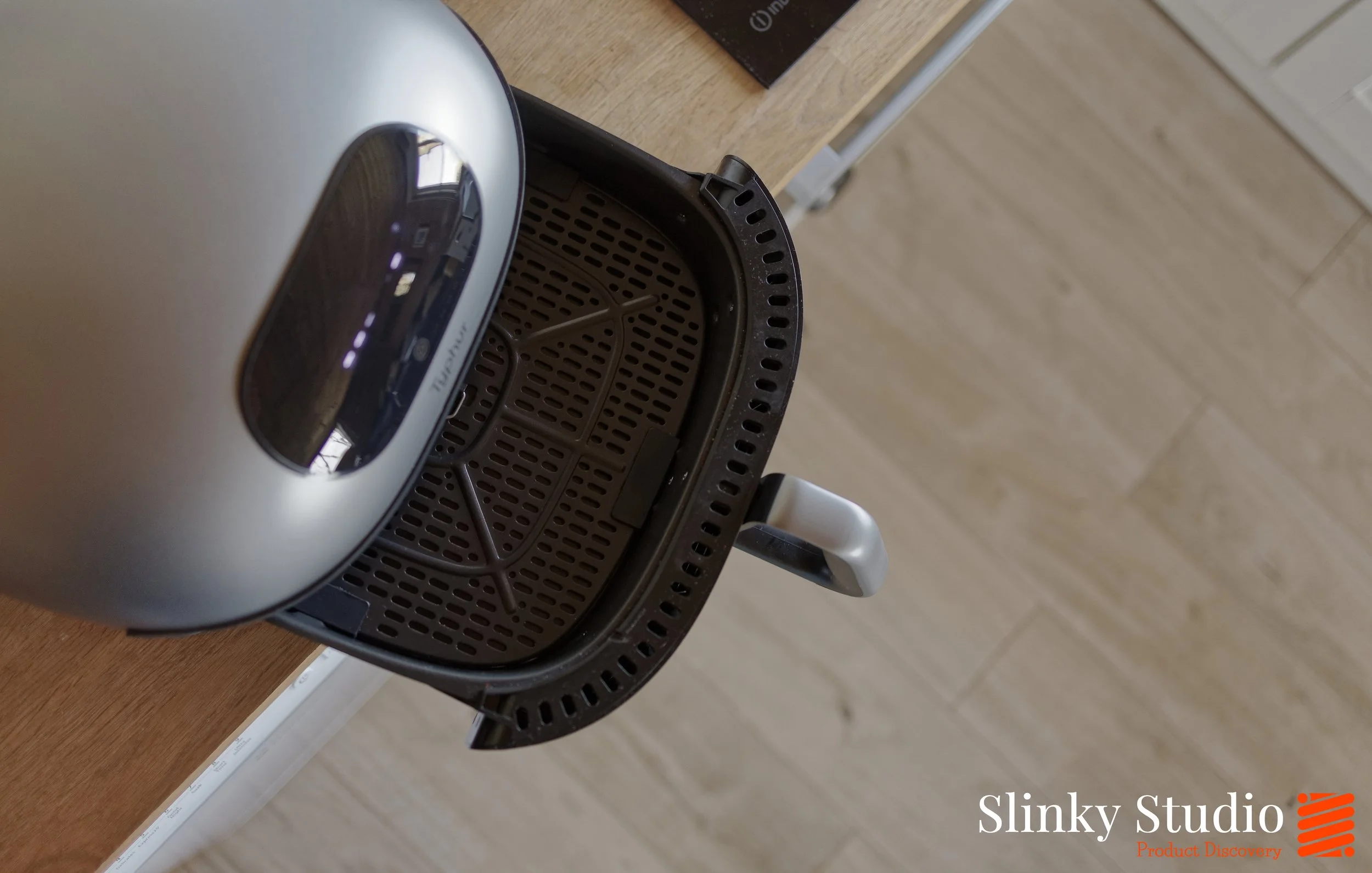 Typhur Dome 2 Air Fryer Basket Being Removed.jpg