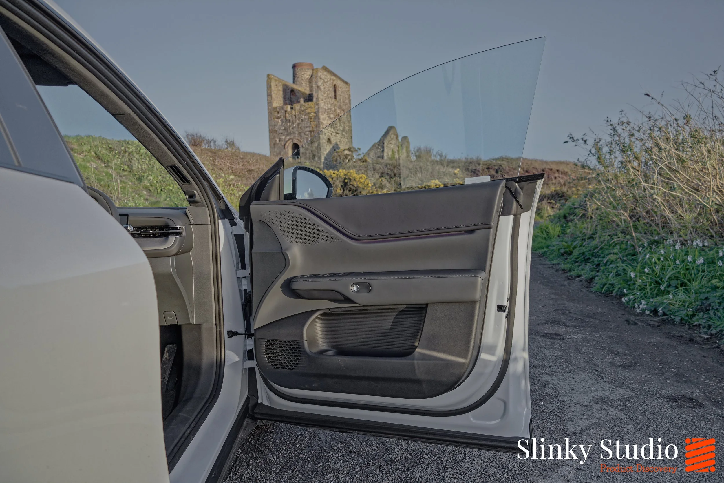 XPENG G6 Dark Grey Interior Door Open.jpg