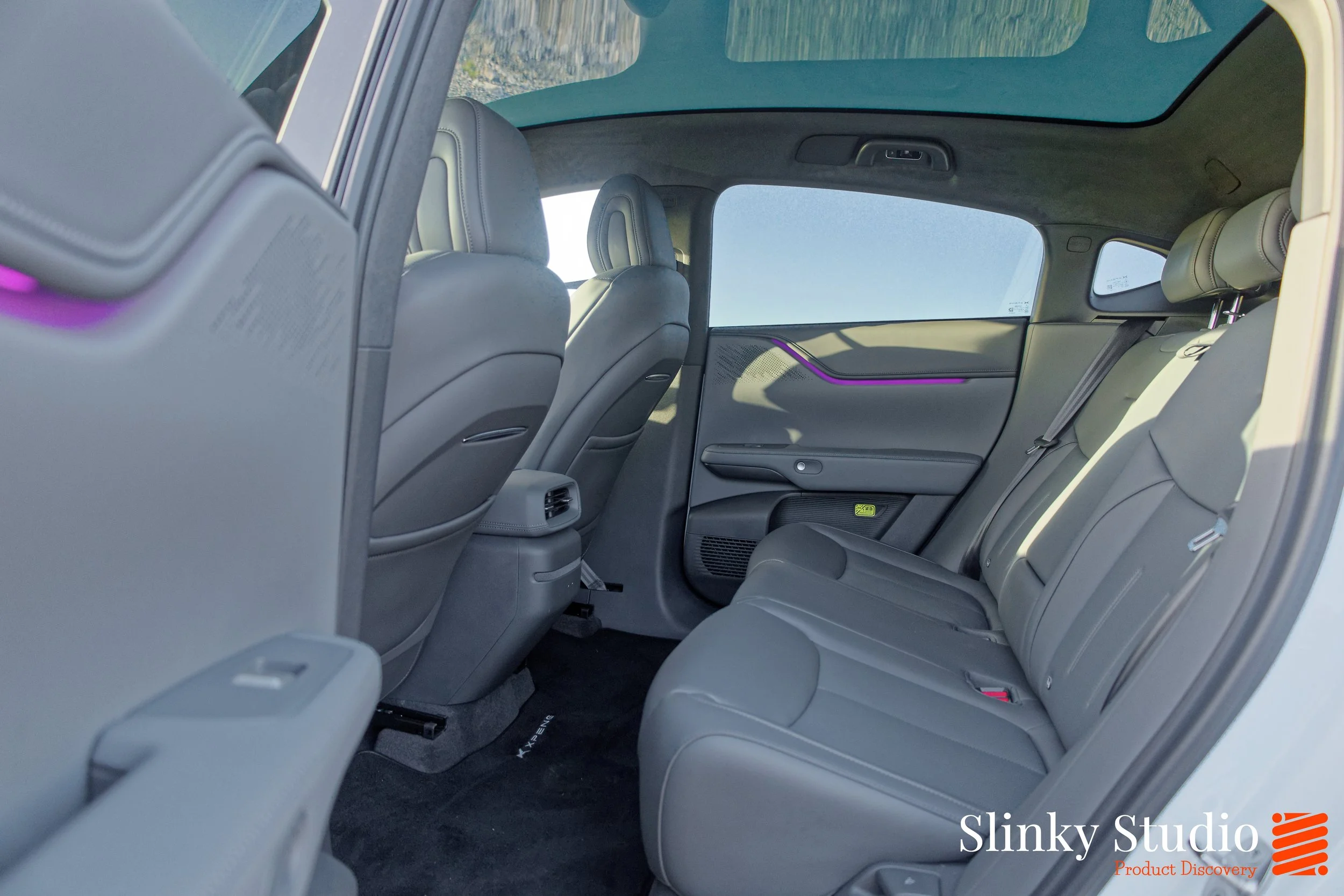 XPENG G6 Interior View of Rear Back Seats Showing Floor Space and Legroom Headroom in Dark Grey.jpg