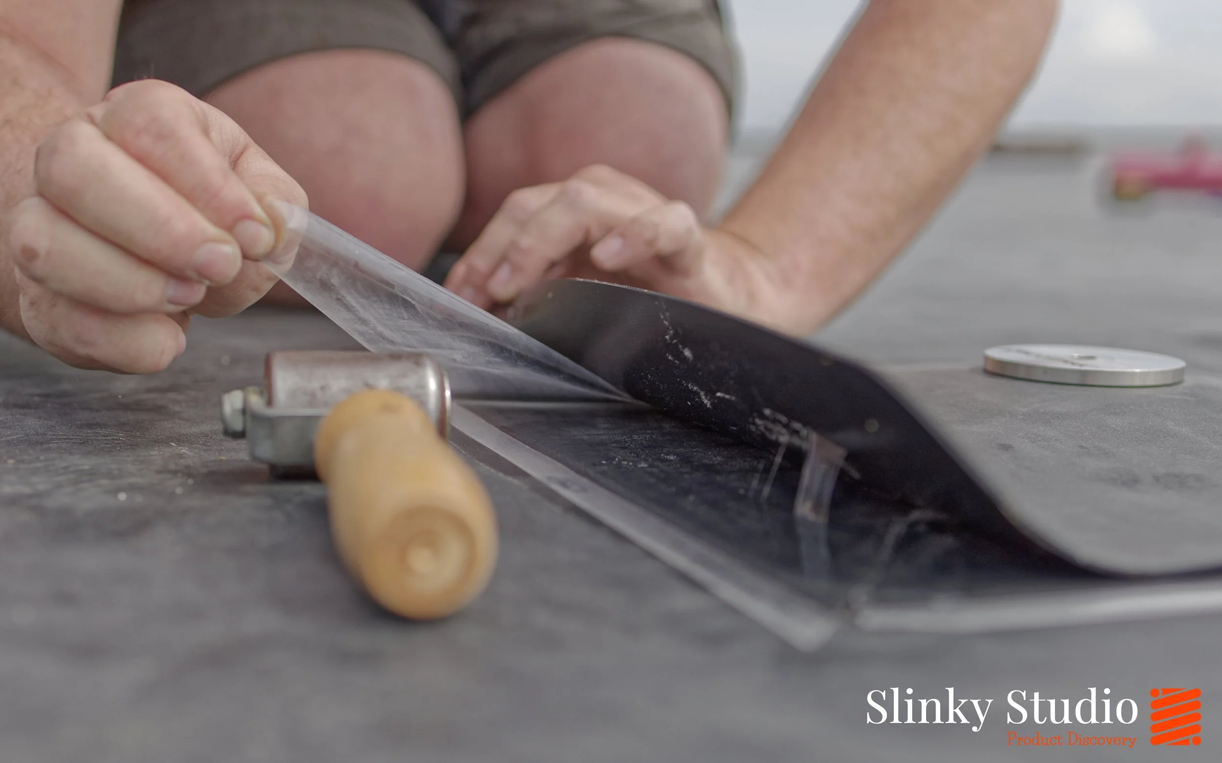 Nicholson ROOFTRAK IFP250 Pulling Backking of Sticky Tape Installation.jpg
