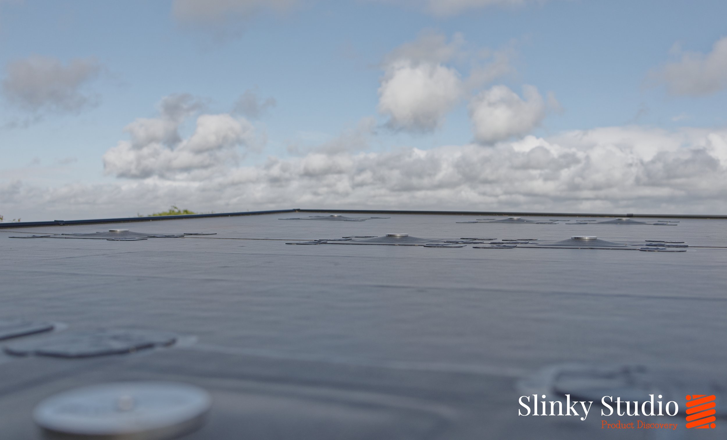 Nicholson ROOFTRAK IFP250 installed on Flat EPDM Membrane Roof Thinness.jpg