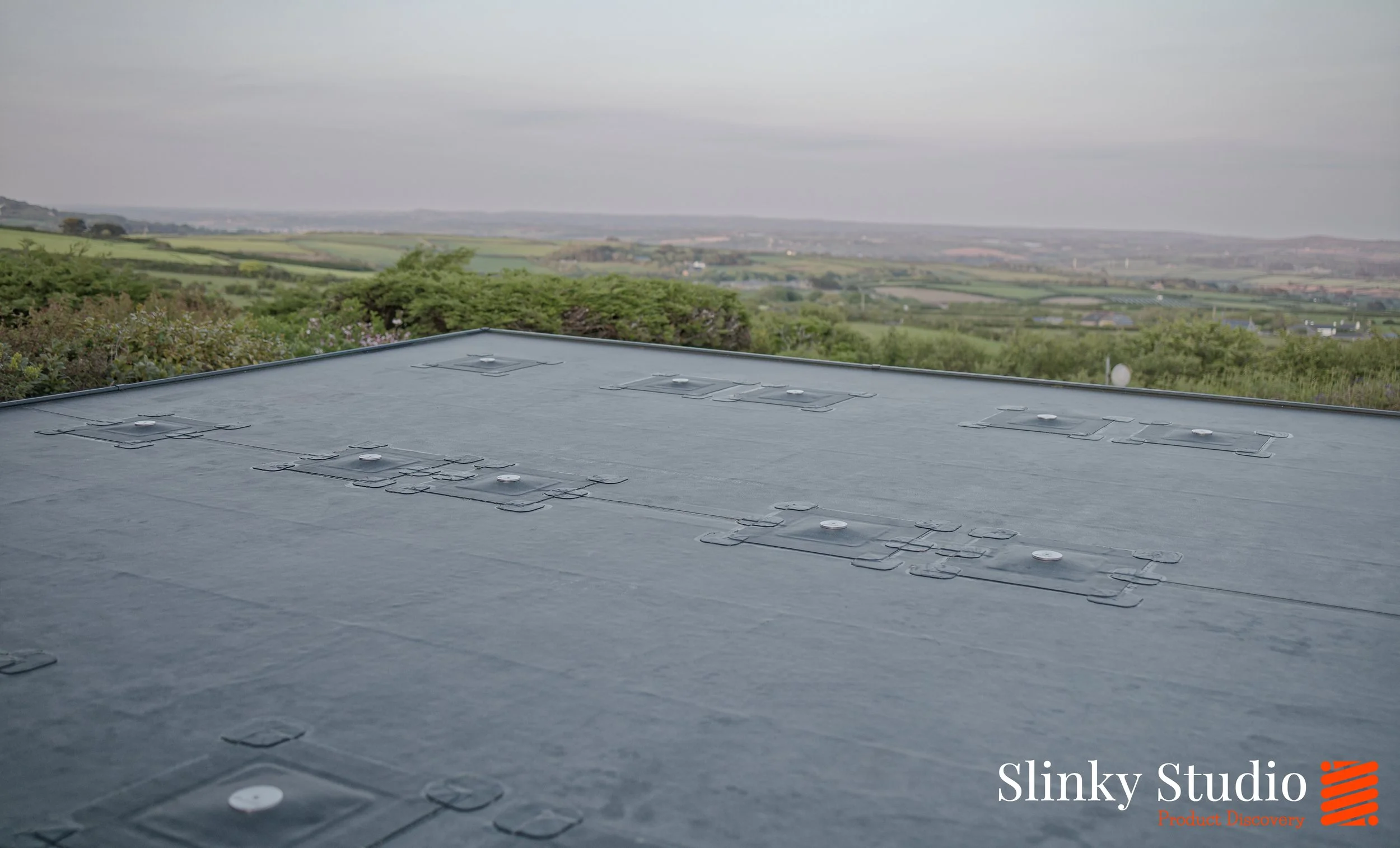 Nicholson ROOFTRAK IFP250 Installed on EPDM Membrane Flat Garage Roof .jpg