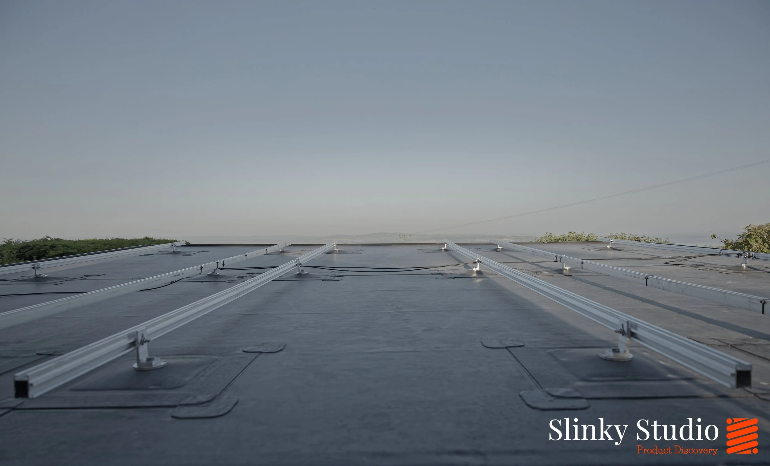 Nicholson ROOFTRAK IFP250 installed on Flat EPDM Membrane Solar PV Roof Rails Layout.jpg