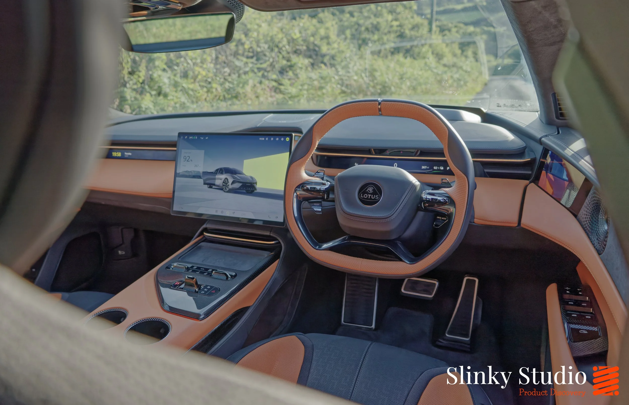 Lotus Emeya Carnelian Colour Interior Steering Wheel View.jpg