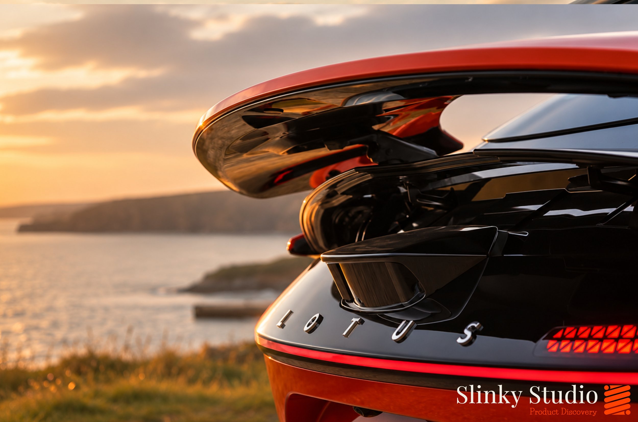 Lotus Emeya Fireglow Orange Text Rear Logo Close Up.jpg