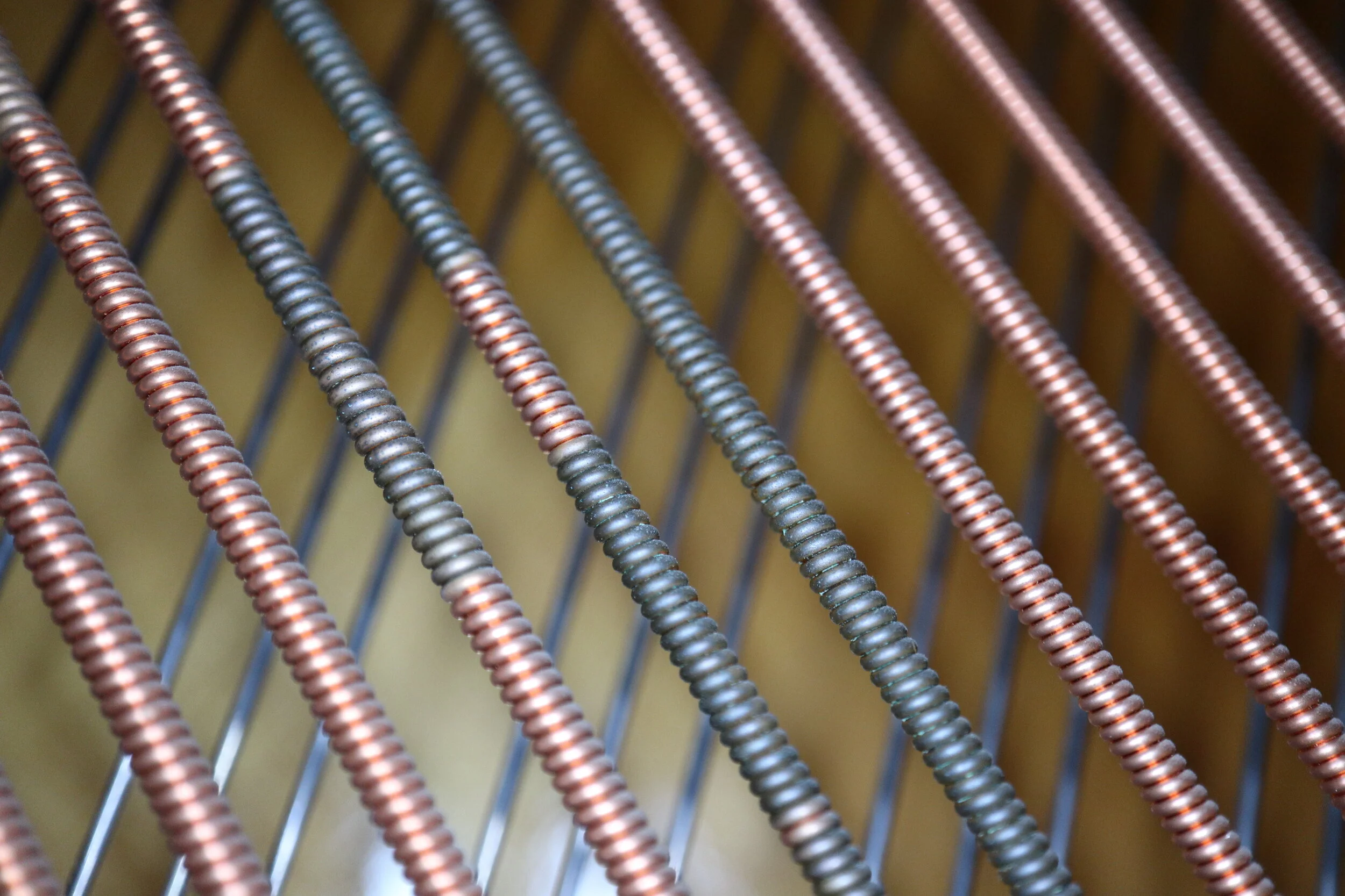 Corroded piano bass strings