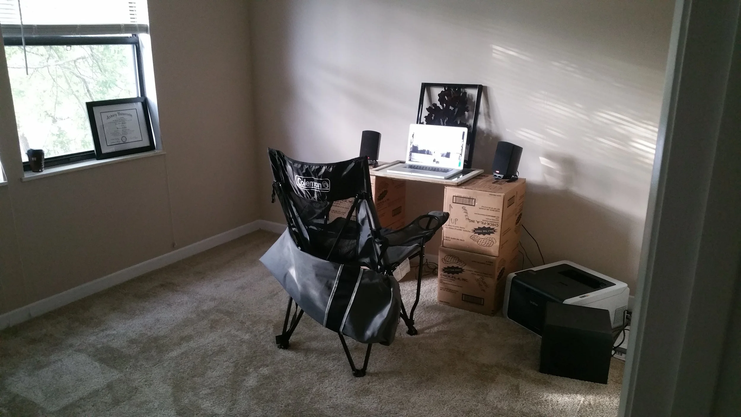 Sherwood Media's new office, day one. Those moving boxes are actually filled with office supplies, and we hadn't moved my old chair in yet. But I had a deadline, so I actually cranked out two videos that day. Thankfully now I have a much more posture-friendly desk solution!