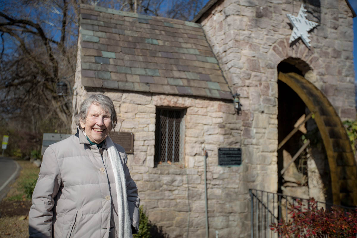 Nona, standing at the historic Westmoreland waterwheel on Sherwood Drive (Dec. 2016).
