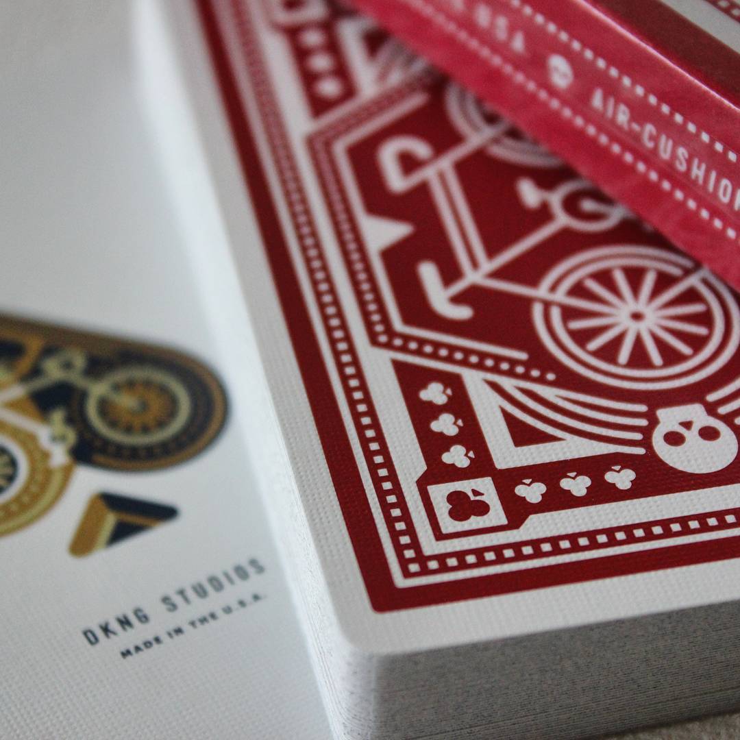Red Wheel Playing Cards by DKNG