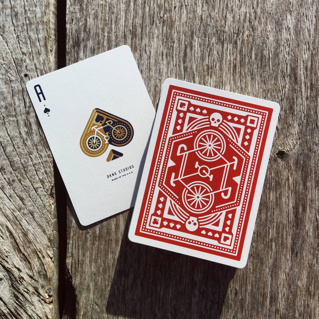 Red Wheel Playing Cards by DKNG
