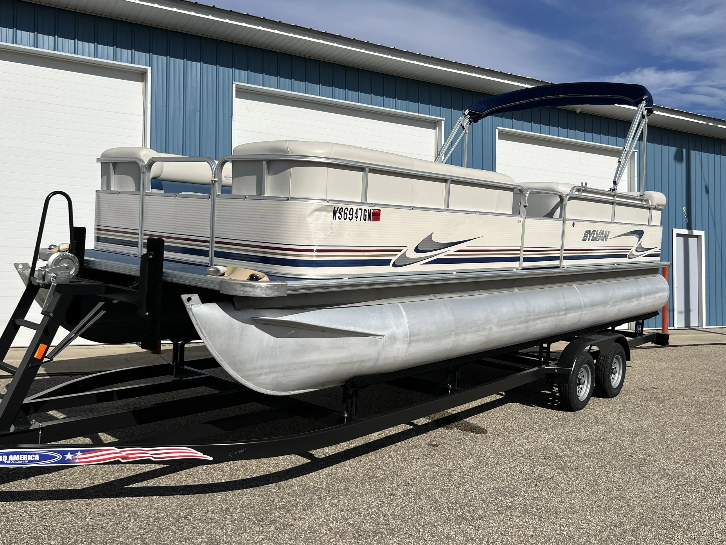 2003 Sylvan 24' Pontoon w 60 Mercury. Includes 2025 Tandem Trailer