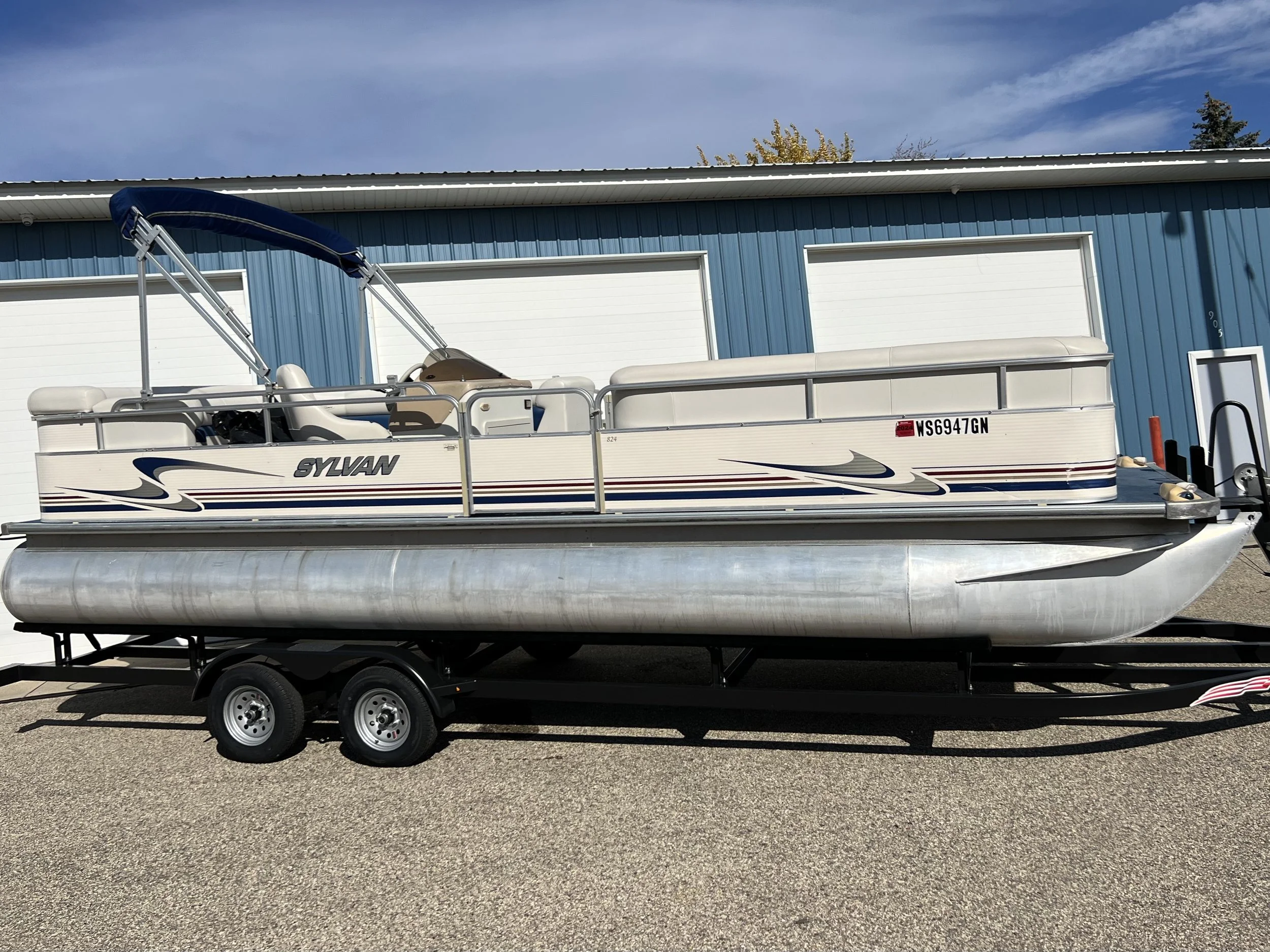 2003 Sylvan 24' Pontoon w 60 Mercury. Includes 2025 Tandem Trailer