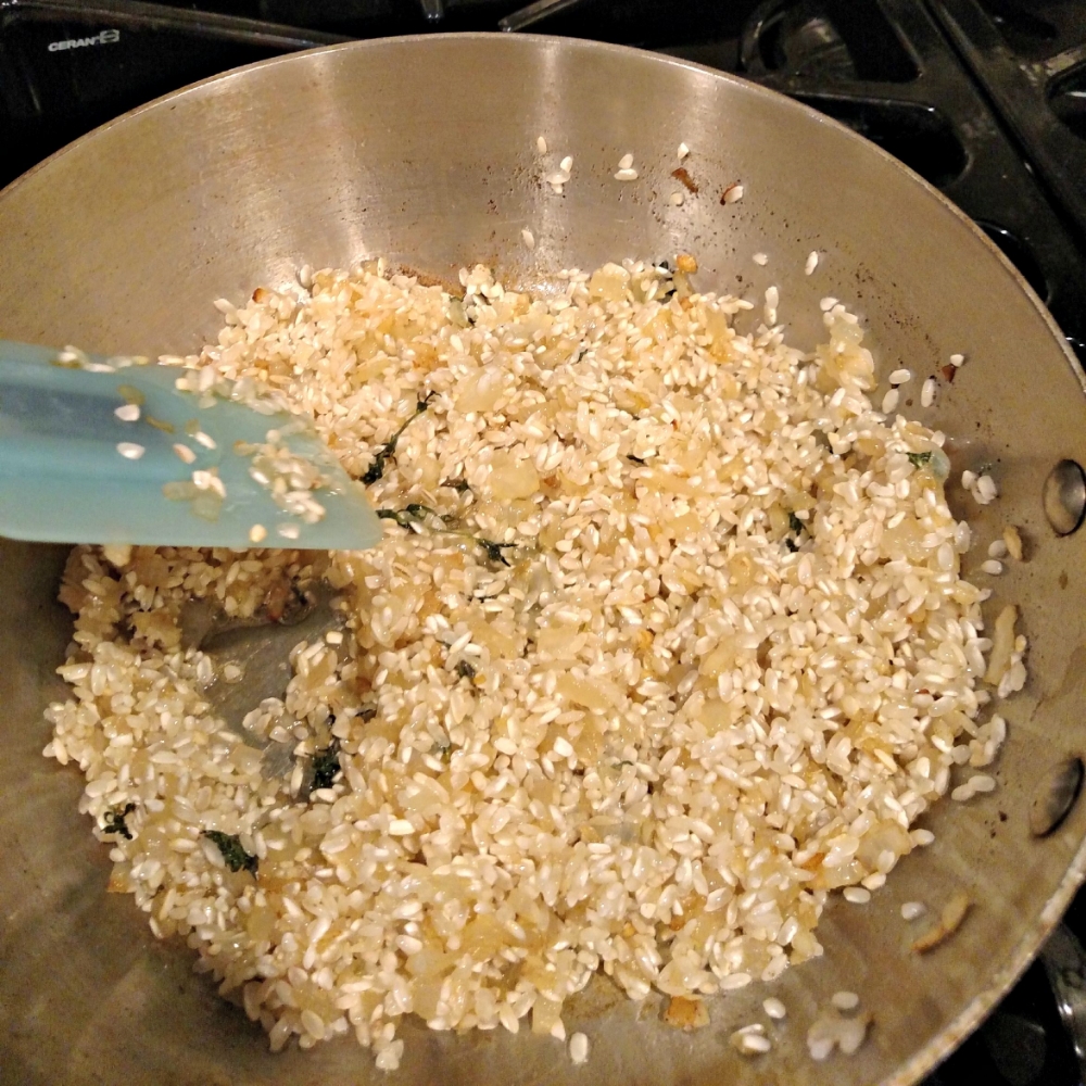 toasted rice in butter and oil. Oh and I threw some thyme in there as well. Did I not mention that?