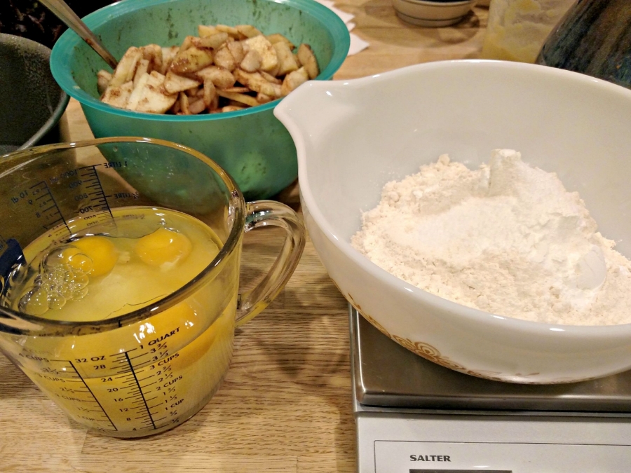 all the ingredients ready to go. note please the 4 cup measuring cup used as bowl, because why wash more than you need to? That sucker has the oil, oj, sugar, eggs and vanilla in there. 