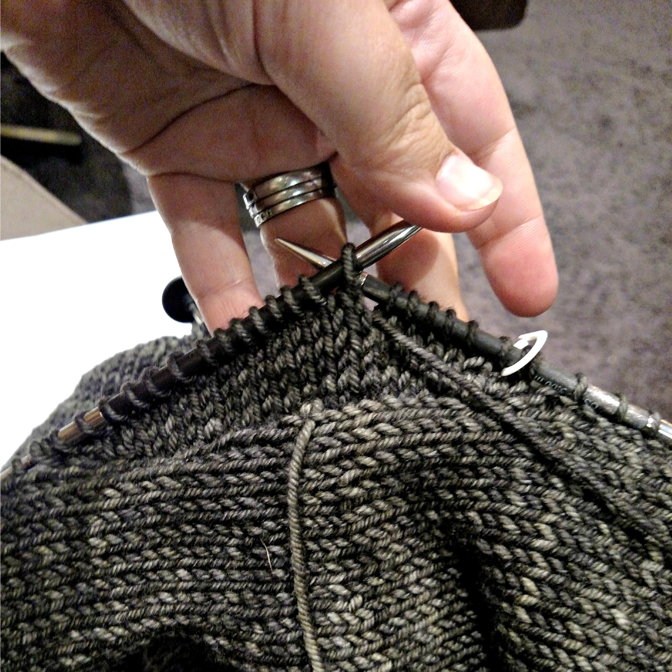 short rows beginning to form the wedge at the top of the sleeve cap