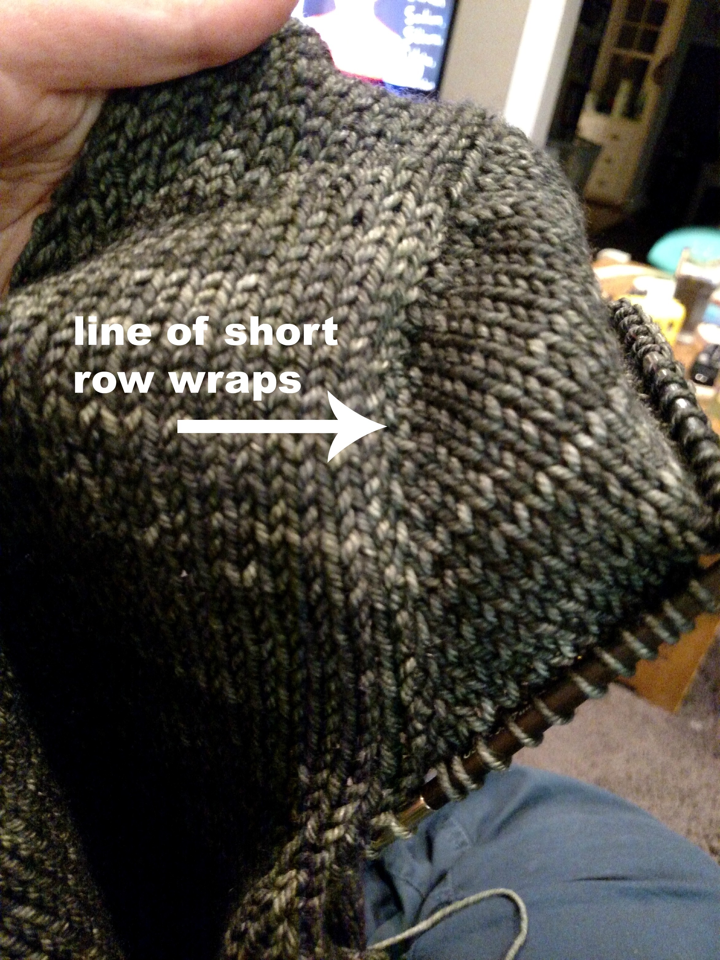 nearly completed short rows. leaving the wraps intact (instead of picking them up as you work across the final rows) leaves a tidy vertical line. 