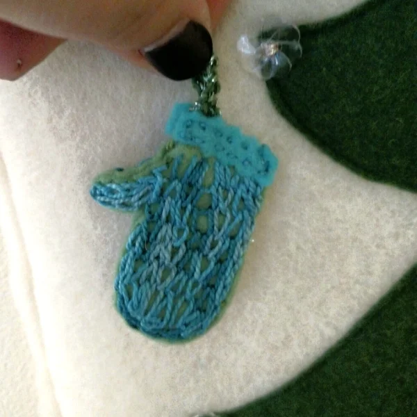 The mitten is one of my absolute favorites. I love how the big chain stitching mimics knitting, and with it on both sides the ornament is super squishy!